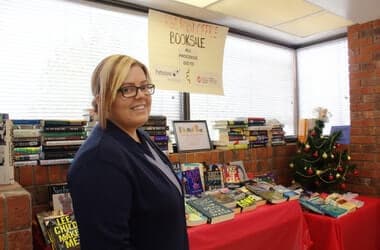 Canada Post worker encourages people to wear plaid for children's mental health